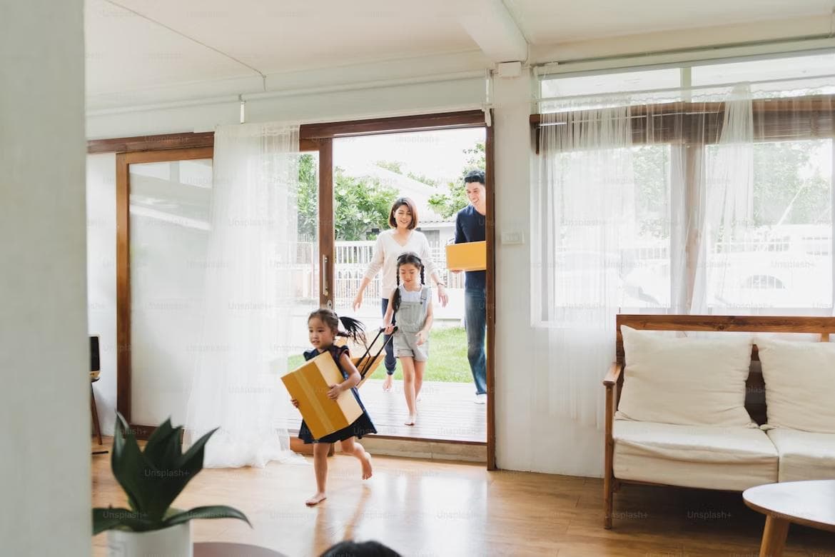 House keys beside a Canadian first-home savings plan and budget worksheet