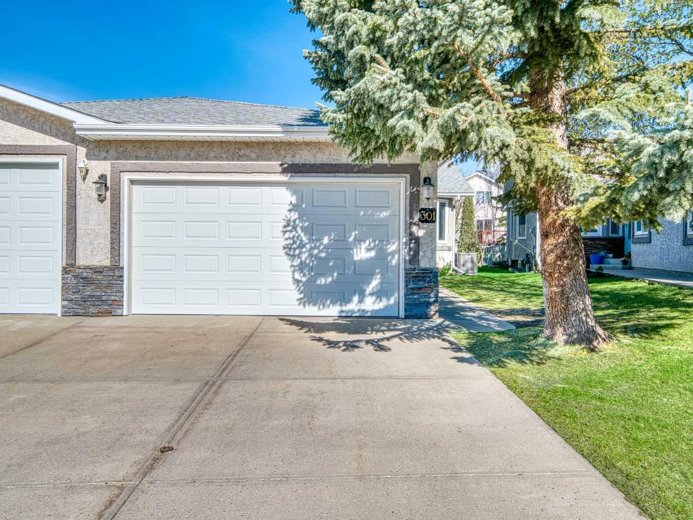 301 Arbour Cliff Close NW — photo 1