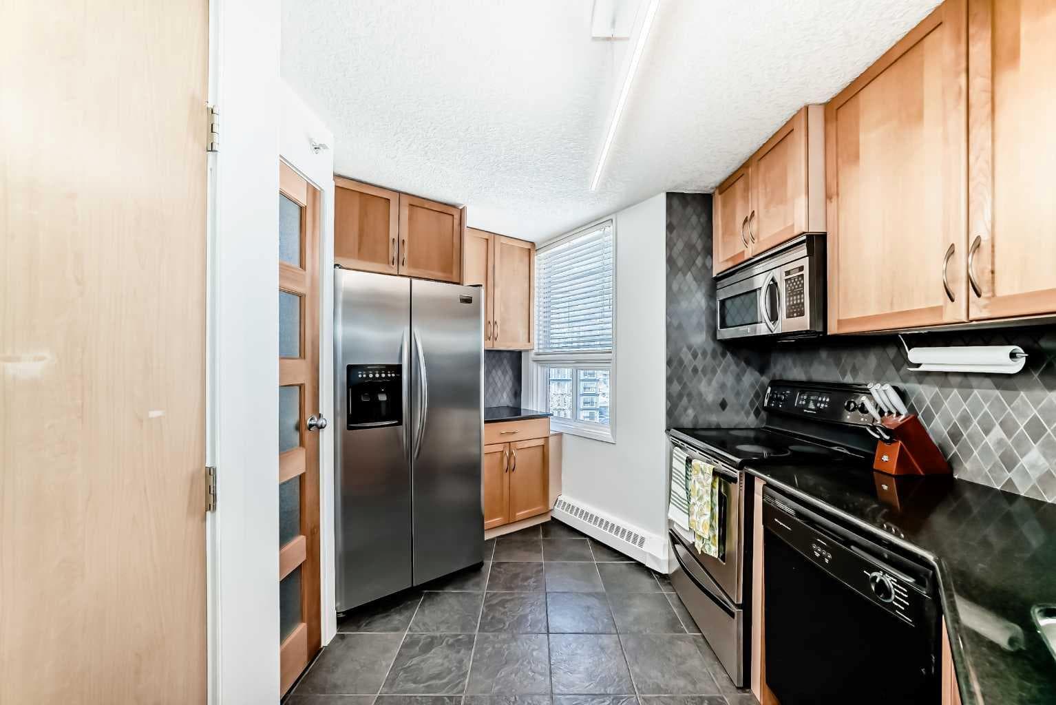 703, 626 15 Avenue SW — photo 5