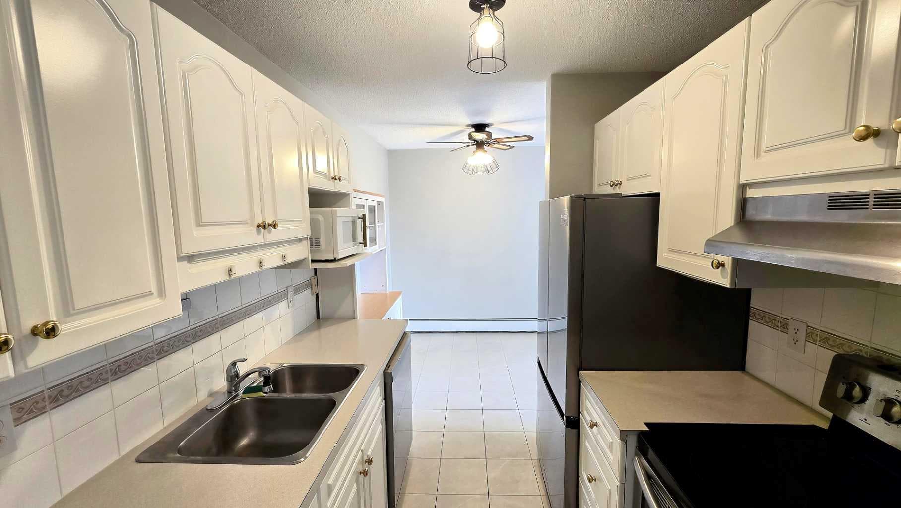 112, 315 Heritage Drive SE — photo 3