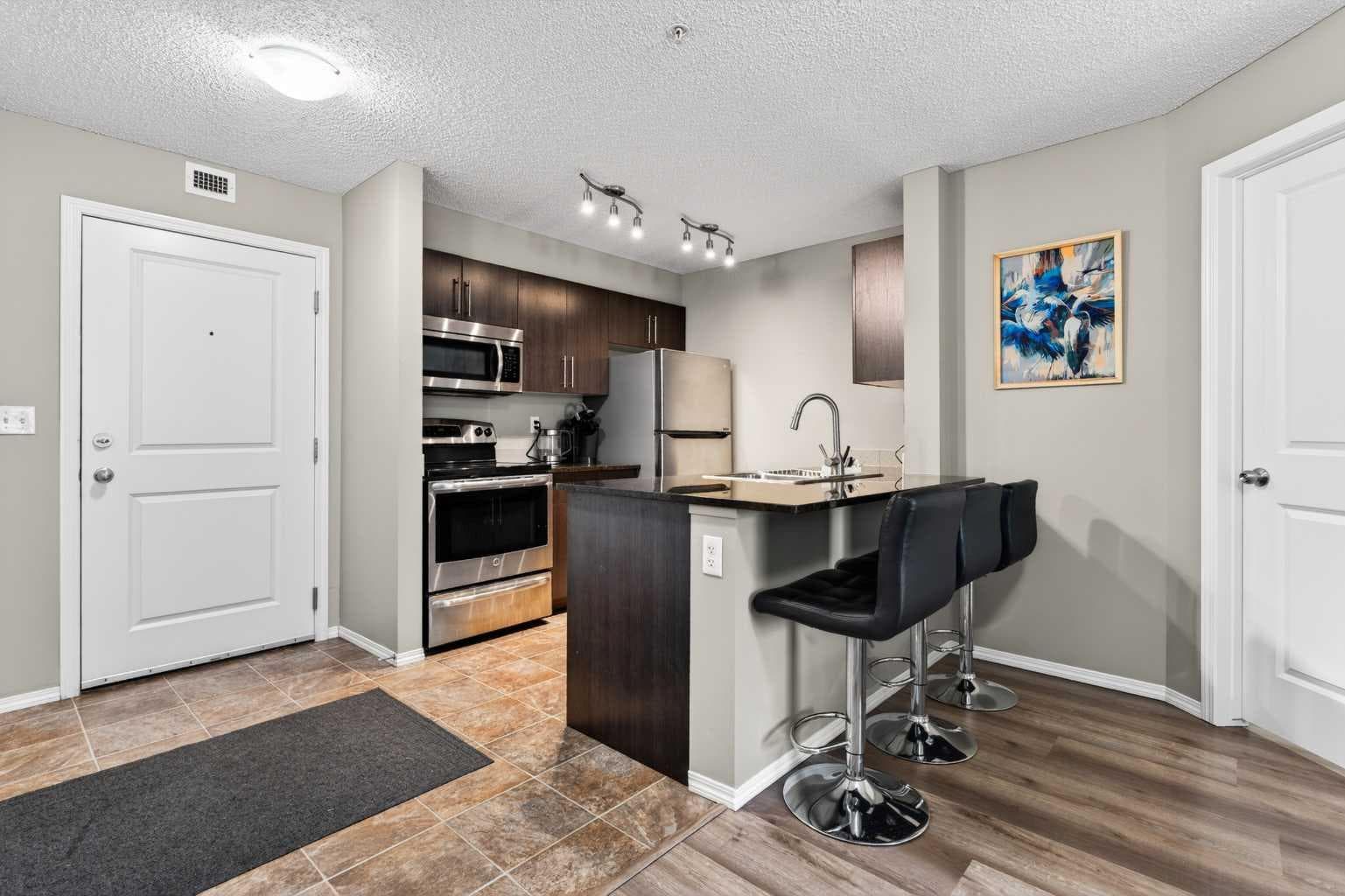 9103, 403 Mackenzie Way SW — photo 1