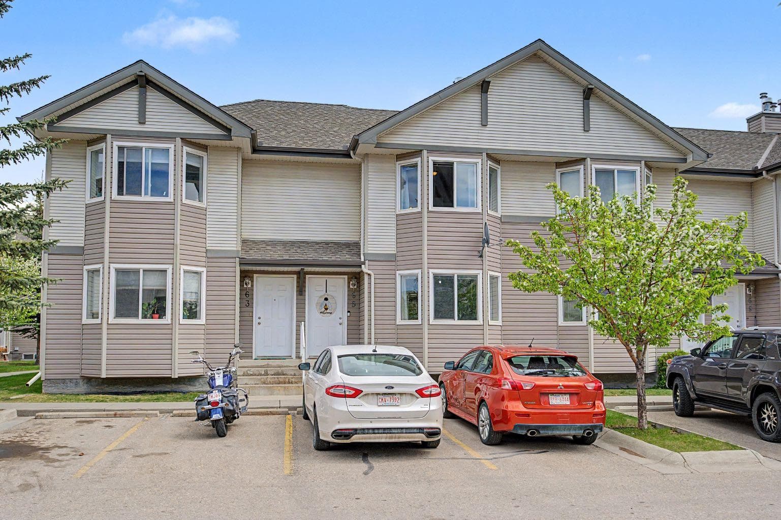 65 Royal Birch Villas NW — photo 1