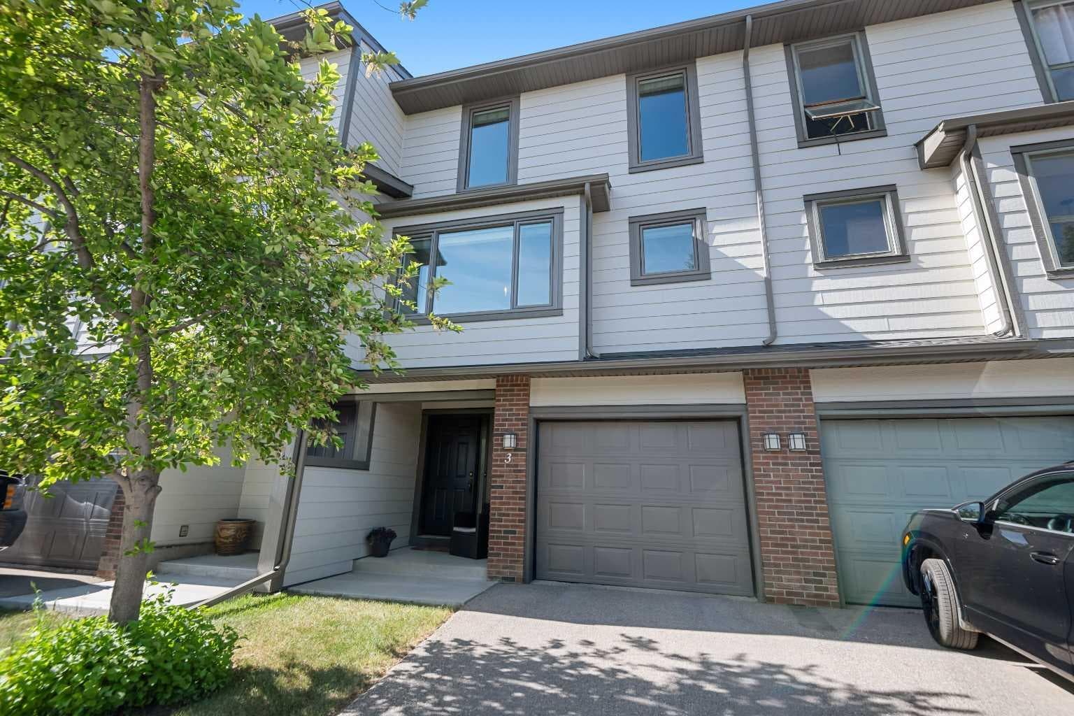 3, 185 Woodridge Drive SW — photo 1