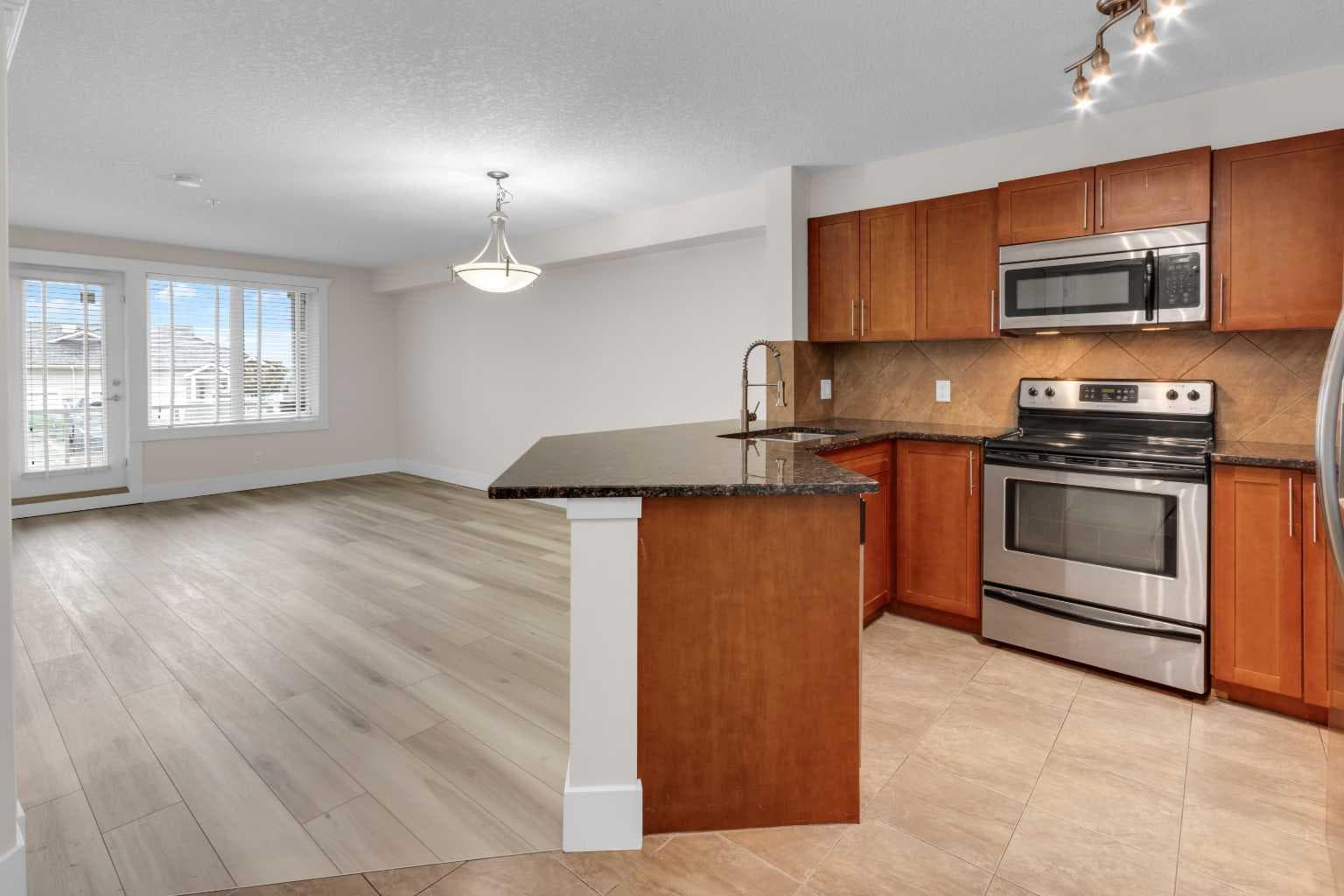 102, 500 Rocky Vista Gardens NW — photo 3