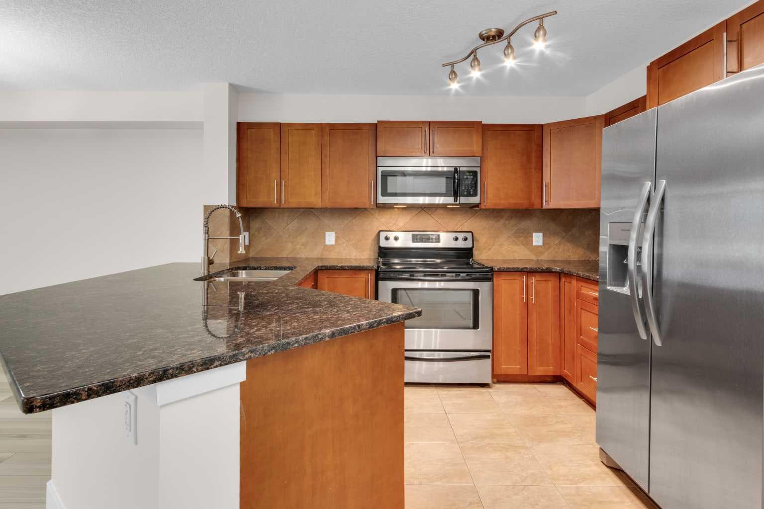 102, 500 Rocky Vista Gardens NW — photo 4