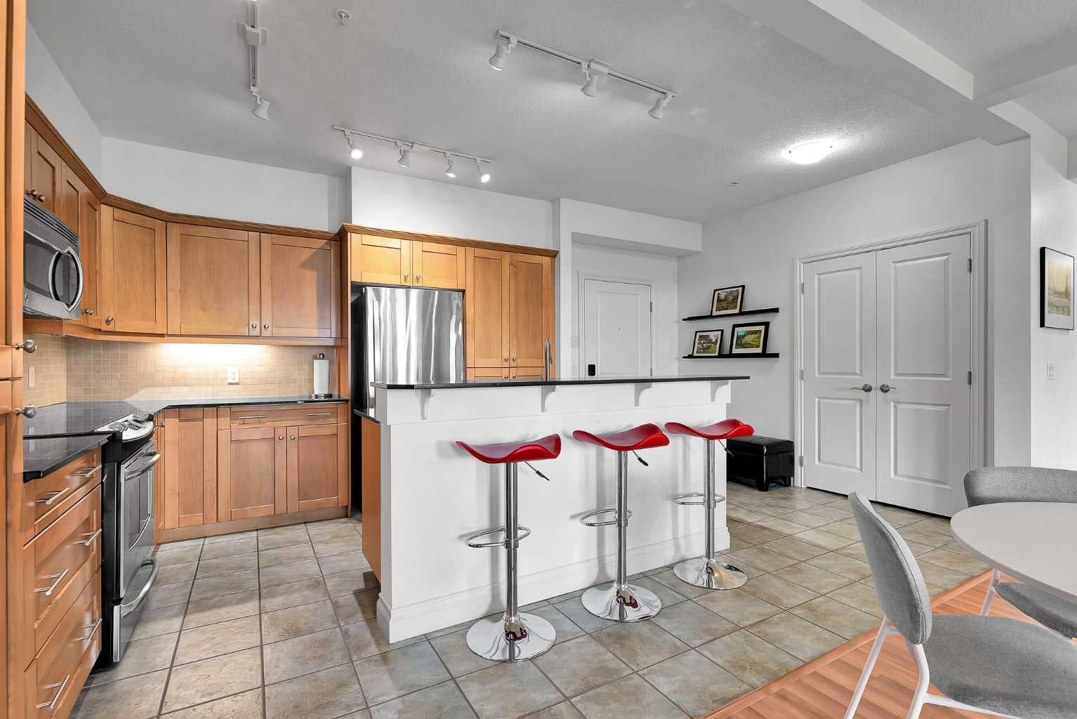 2105, 10221 Tuscany Boulevard NW — photo 5