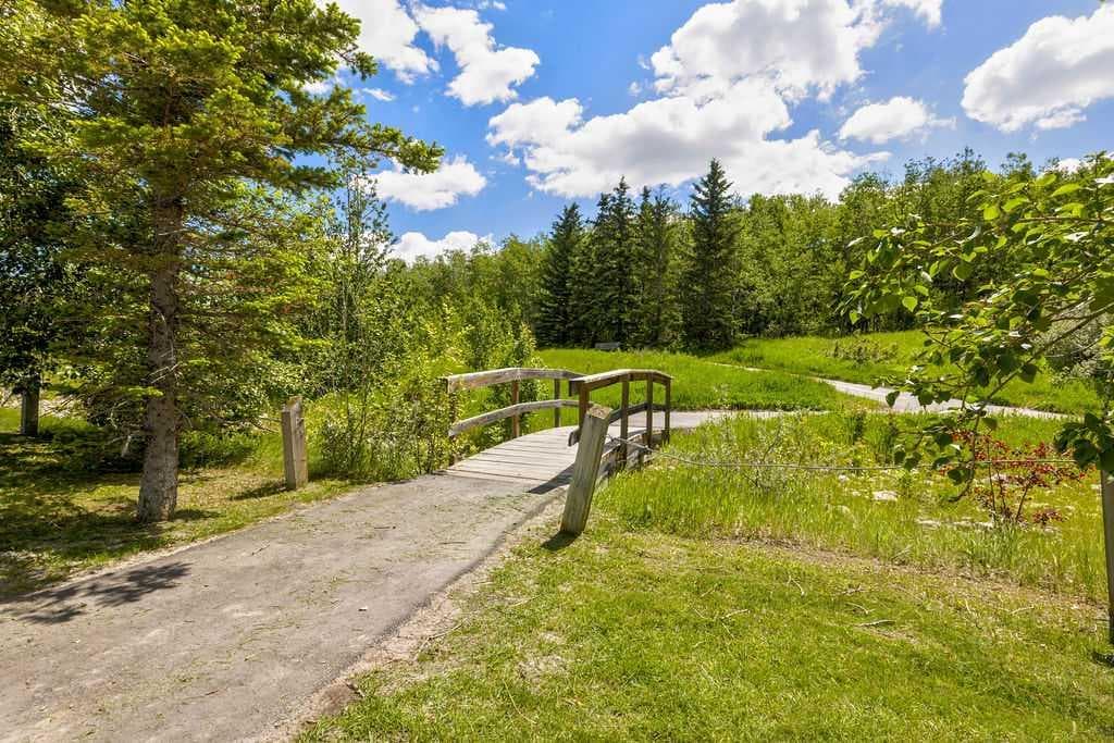 155 Citadel Meadow Gardens NW — photo 2