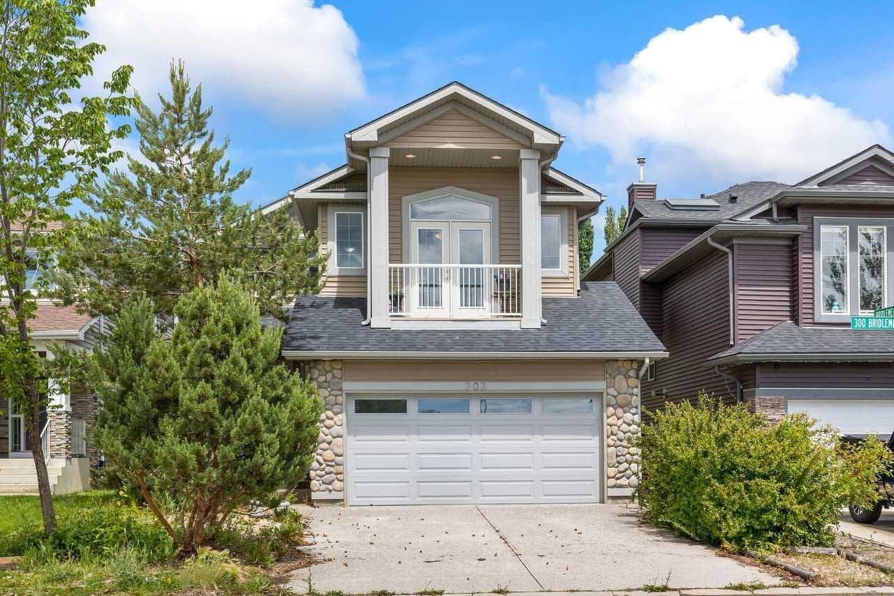 303 Bridlemeadows Common SW — photo 1