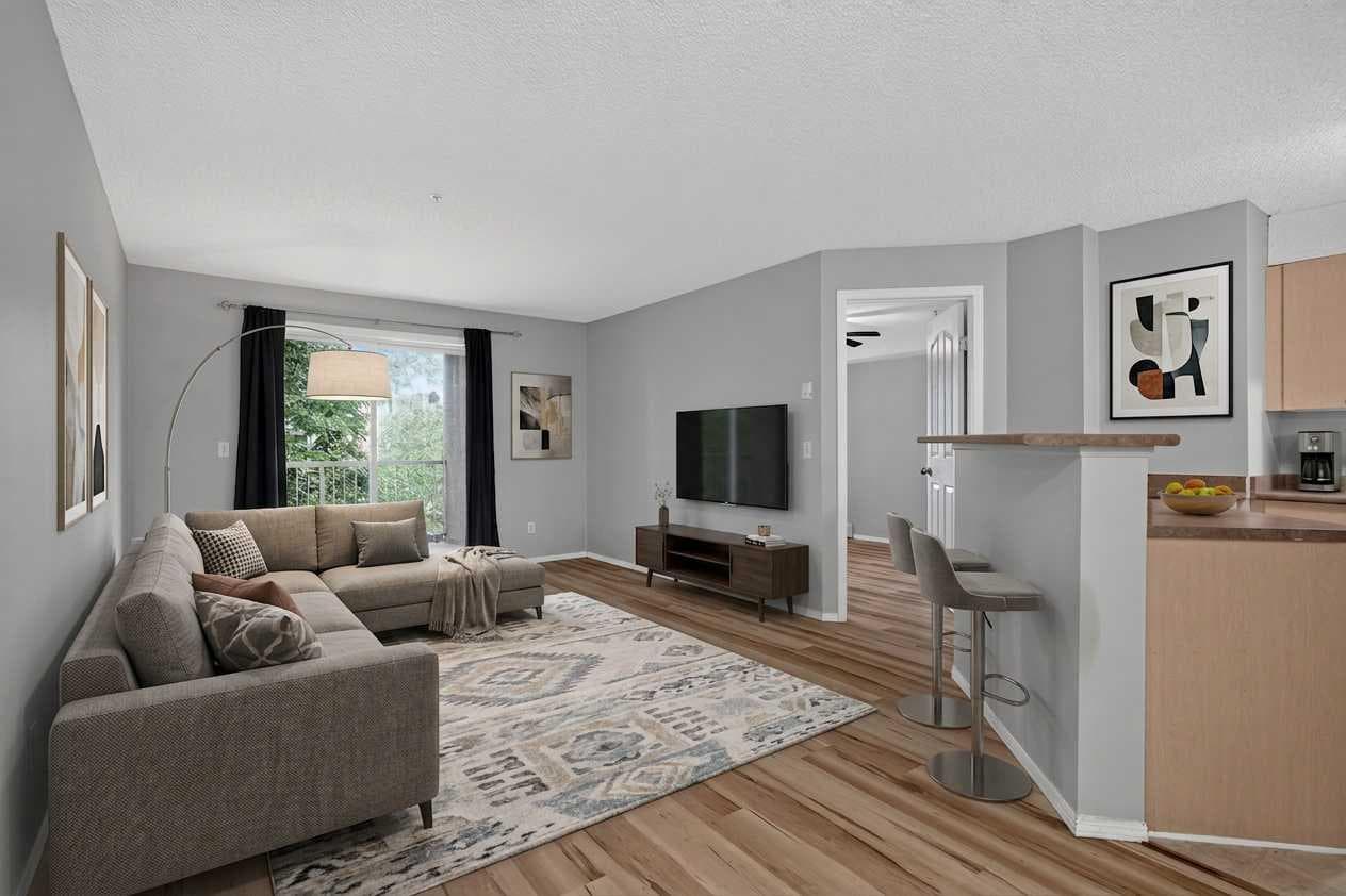 8223, 304 Mackenzie Way SW — photo 3