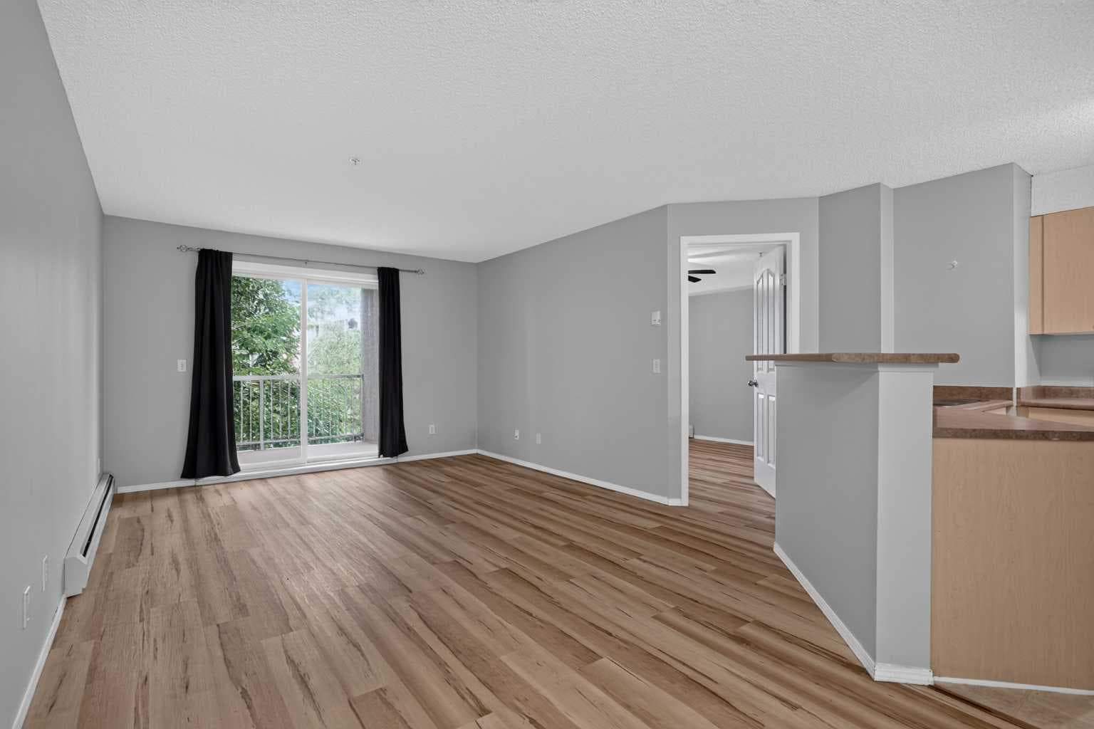8223, 304 Mackenzie Way SW — photo 4