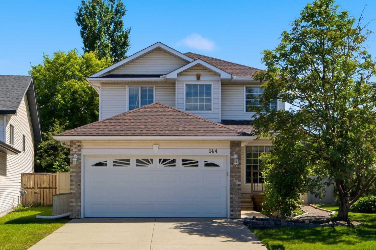 144 Douglas Ridge Close SE — photo 1