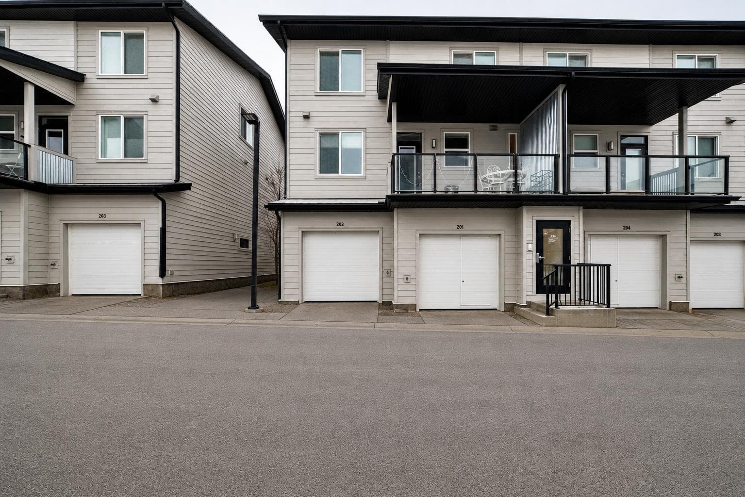 202, 245 Redstone Walk NE — photo 2