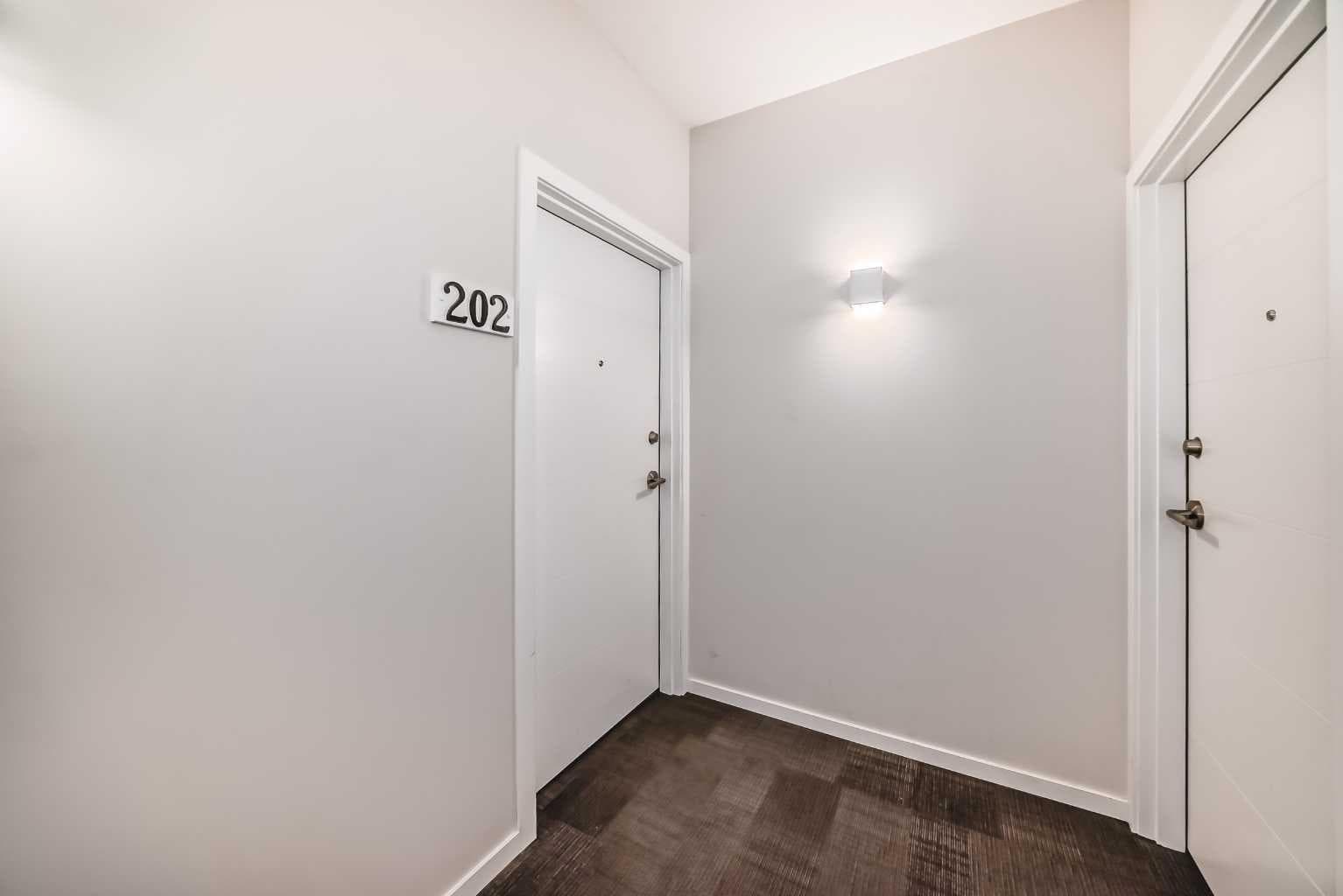 202, 245 Redstone Walk NE — photo 3