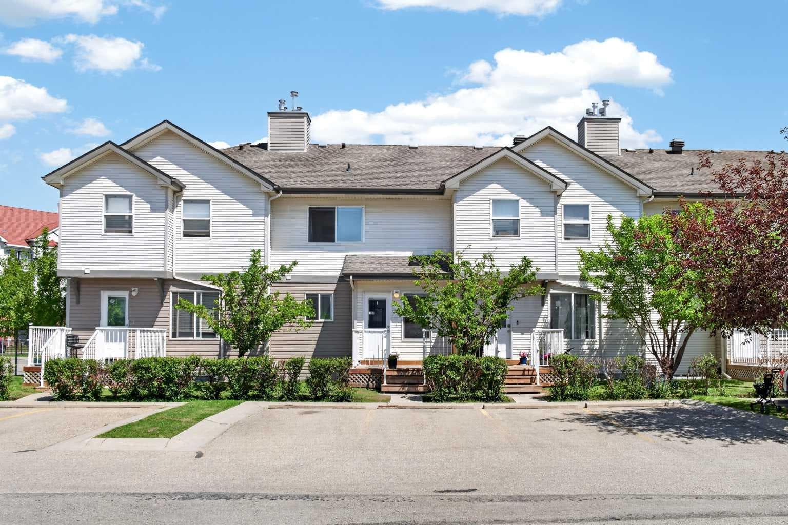 118 Royal Birch Villas NW — photo 1
