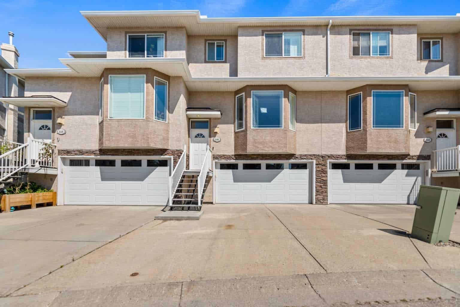116 Country Hills Gardens NW — photo 1