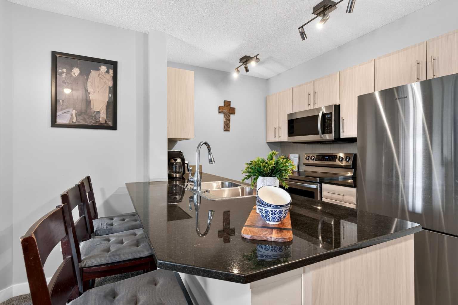 2403, 403 Mackenzie Way SW — photo 3