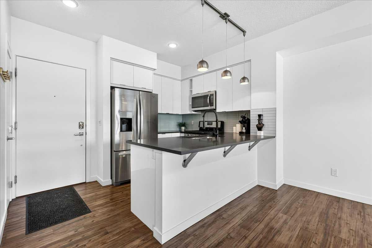 411, 120 18 Avenue SW — photo 5