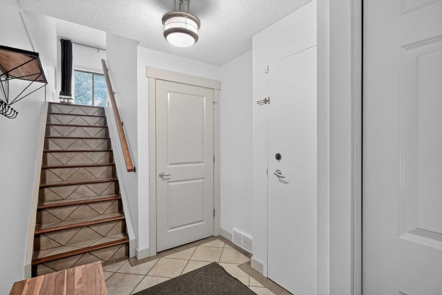 571 Point Mckay Grove NW — photo 2