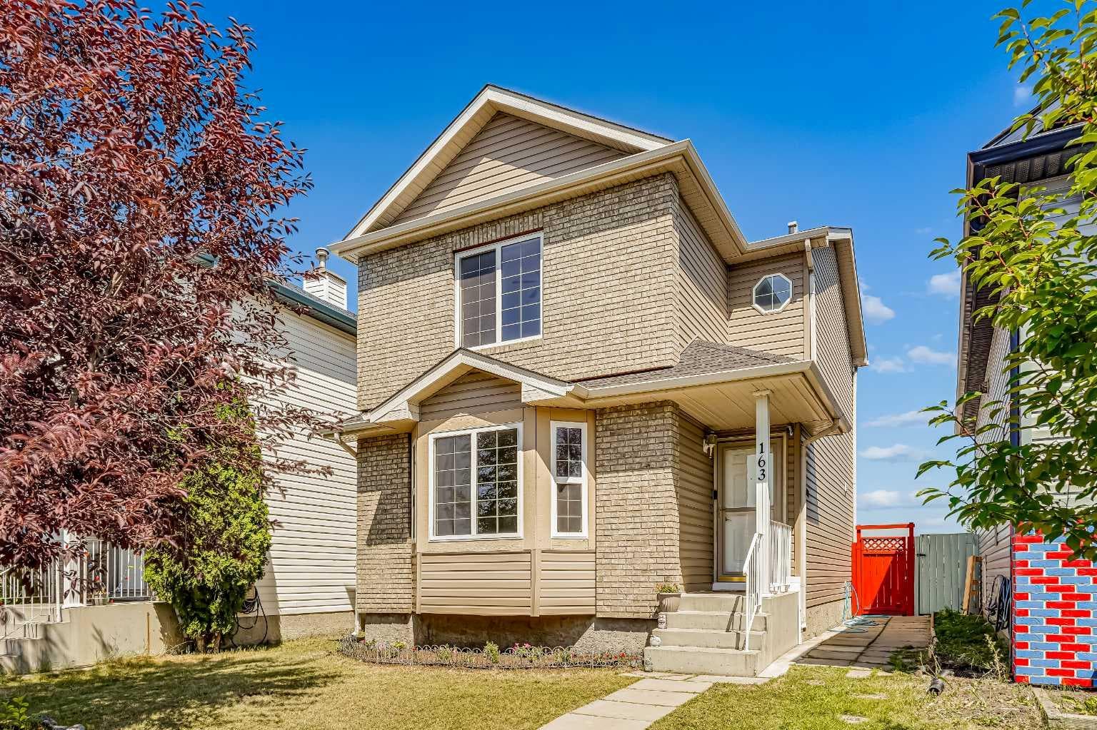163 Saddlemont Crescent NE — photo 1