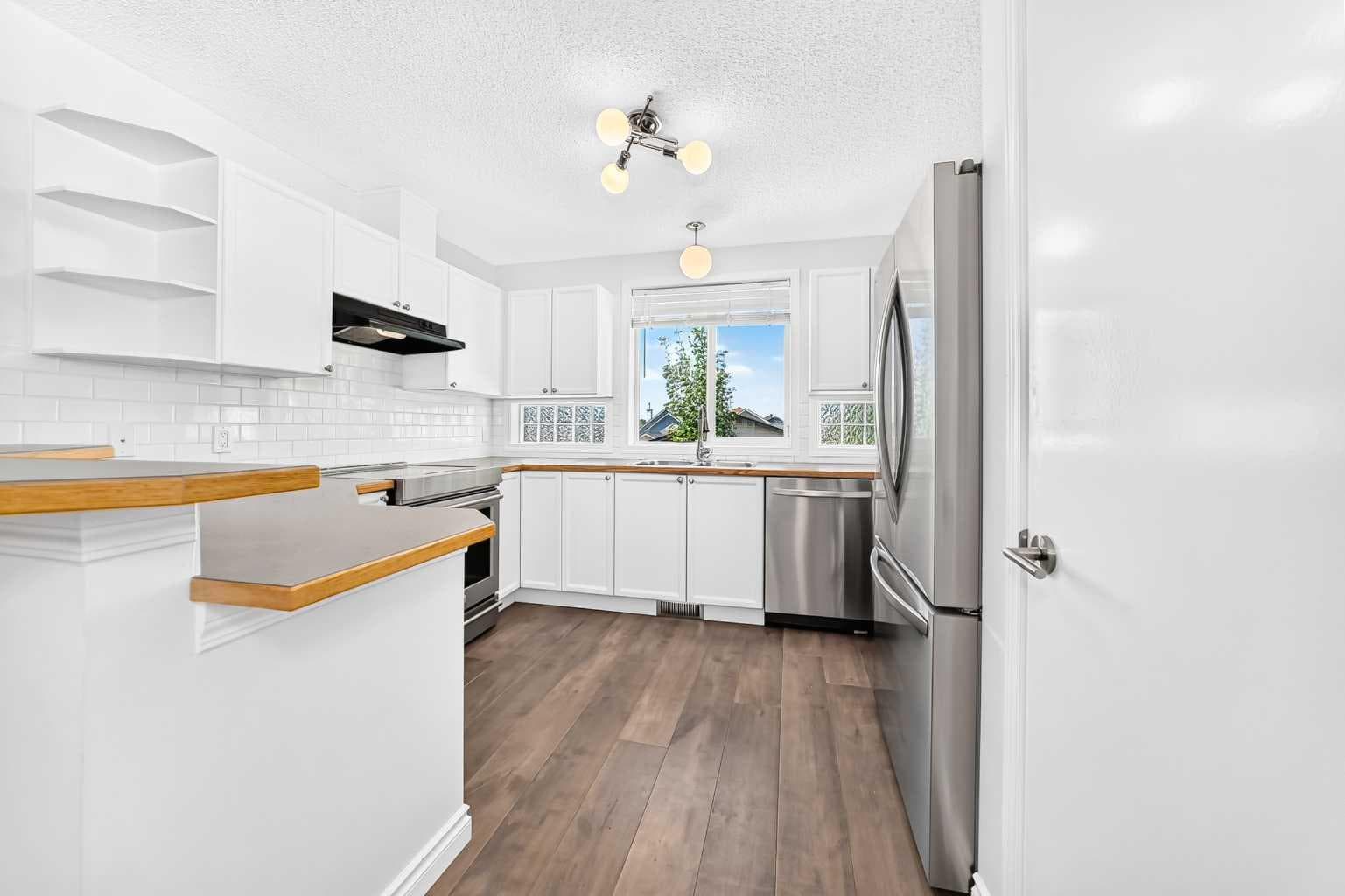 708 Tuscany Drive NW — photo 3