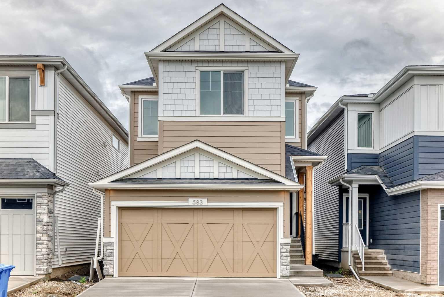 583 Buffaloberry Manor SE — photo 1
