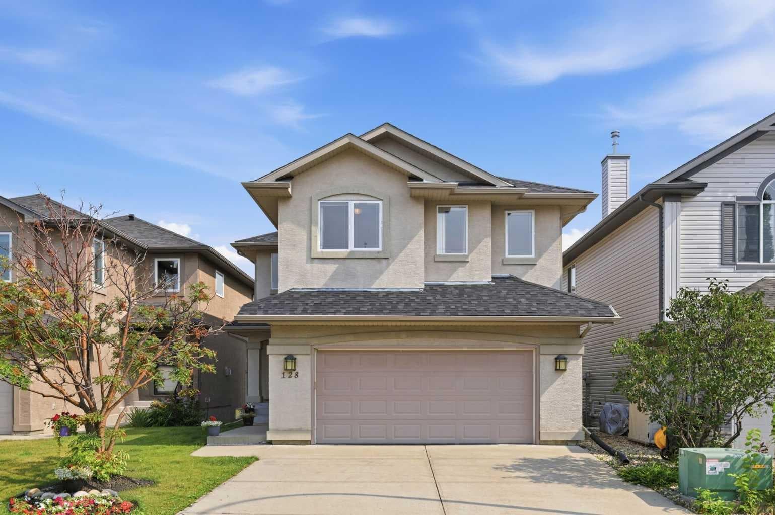 128 Tuscany Ravine Terrace NW — photo 1